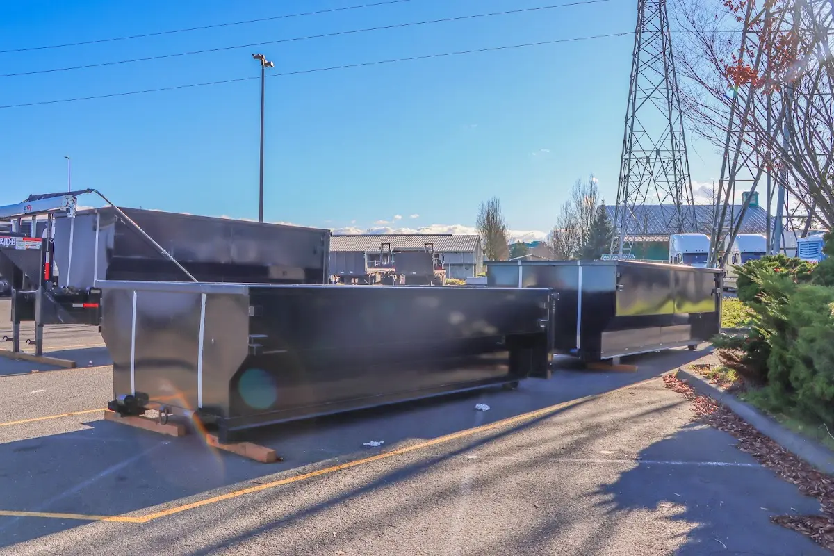 Roll-off dumpster ready for waste disposal at job site for Construction Dumpster Rental in Rochester